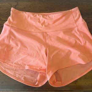 Speed Up High rise shorts 4” in Sunny Coral